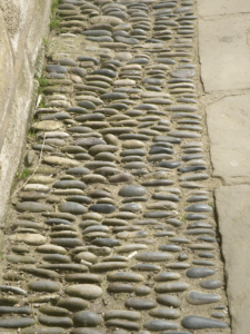 Flags and cobble path at Robin Hoods Bay